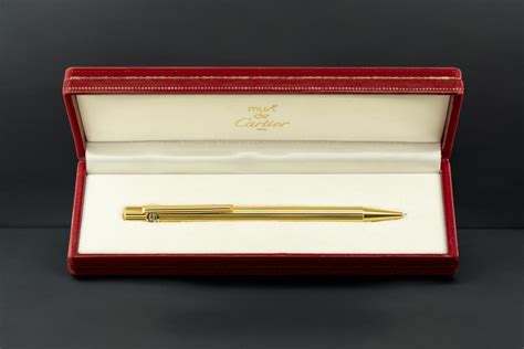 must de cartier penna oro scatola rossa|must de cartier original.